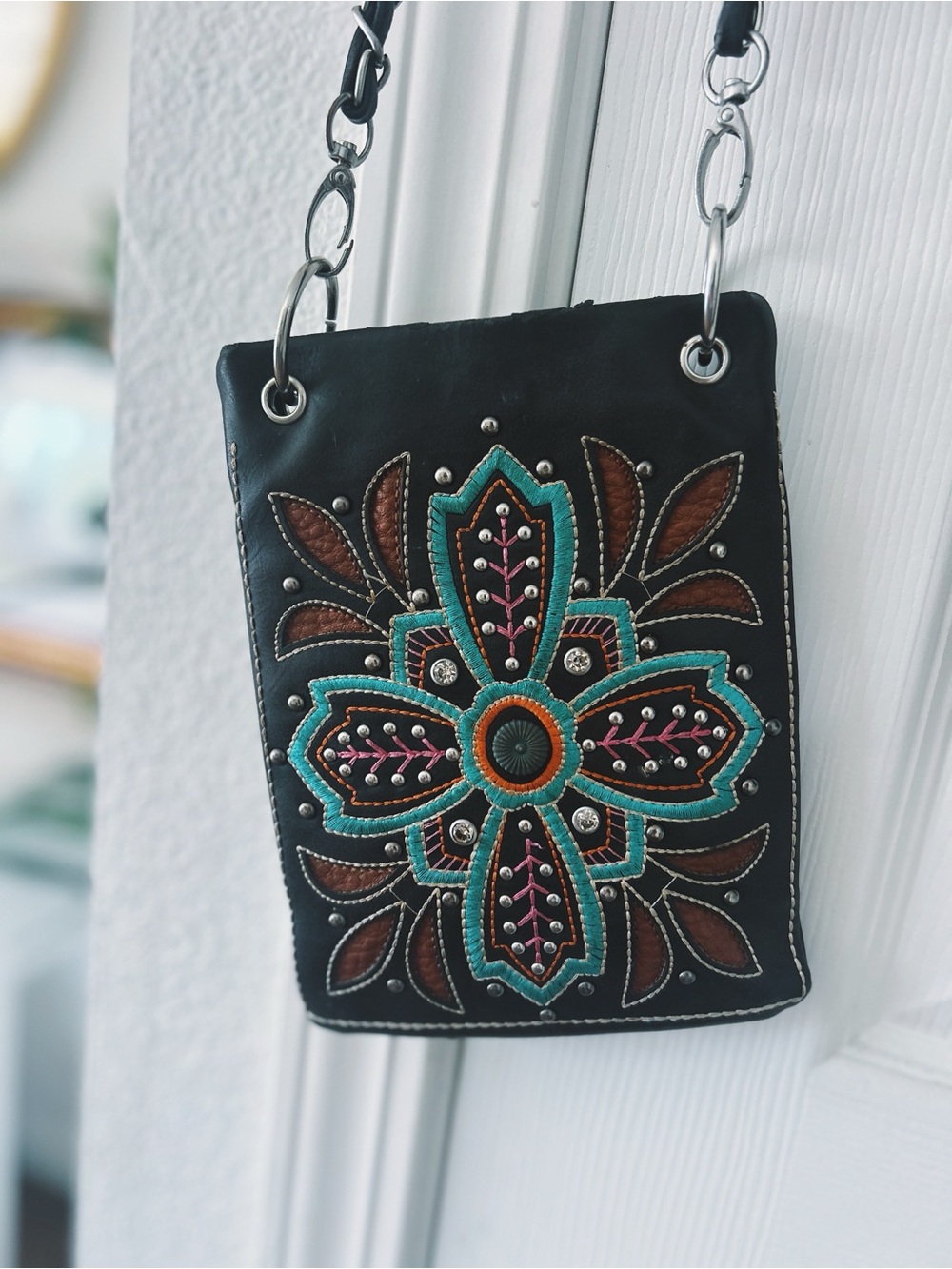 Embroidered Black Crossbody Bag with Turquoise Floral Accent